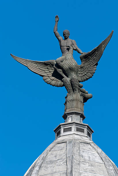 istock Phoeninx sculpture against a clear blue sky in Madrid 451248553