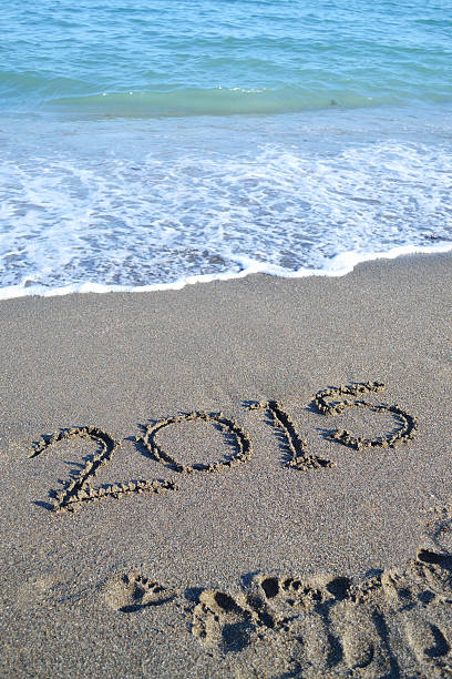 istock New Year 2015 at the beach 451256183