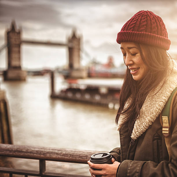 istock chinese tourist smiling in London 451256921