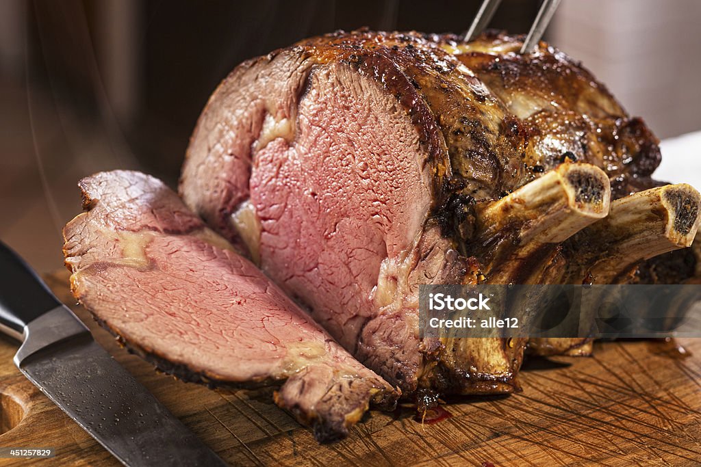 Prime Rib Roast Prime rib roast on cutting board. Roasted Prime Rib Stock Photo