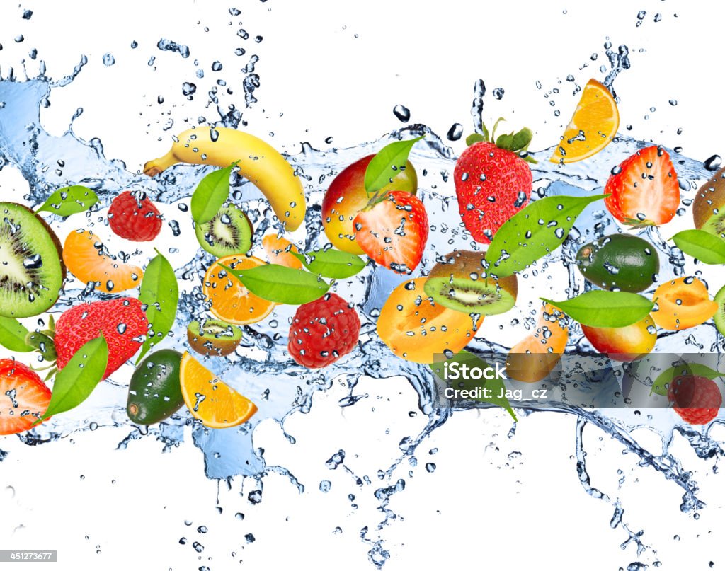 Fresh fruits Fresh fruits falling in water splash, isolated on white background Freshness Stock Photo