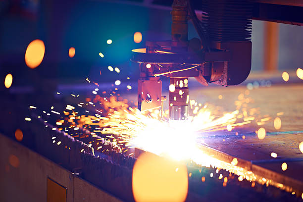 Cutting metal by plasma laser stock photo