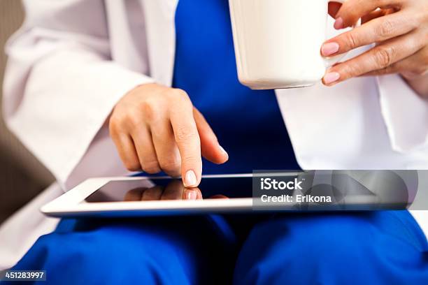 Doctor Touching Digital Tablet Stock Photo - Download Image Now - Personal Data, Close-up, Computer