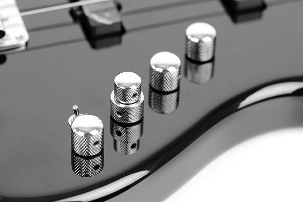 istock Electric Bass Guitar isolated on white background 451291383