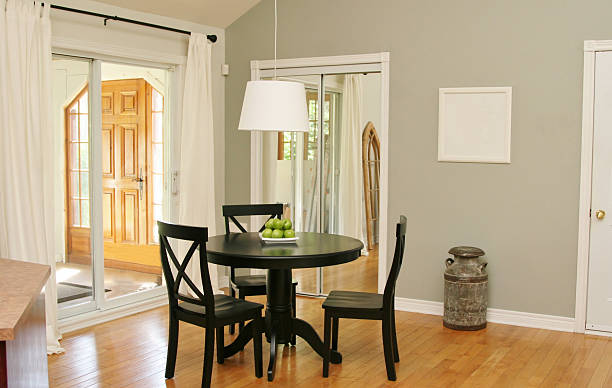 istock Dining room with patio doors 451292287