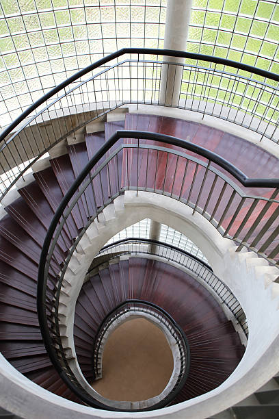 istock Upside view of a spiral staircase 451298047