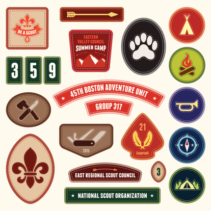 Set of scouting badges and merit badges for outdoor activities.