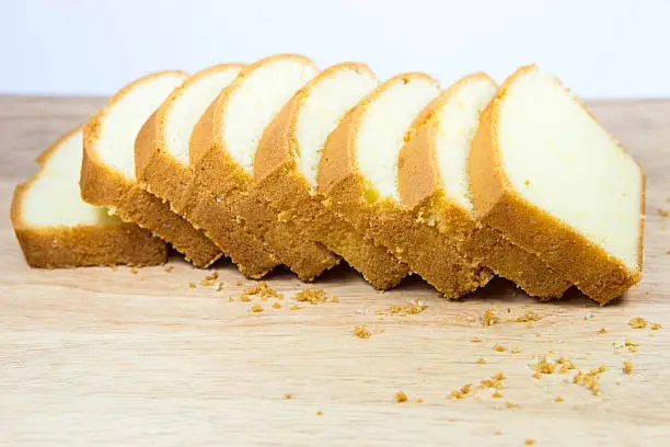 buttercake sliced on wood tray