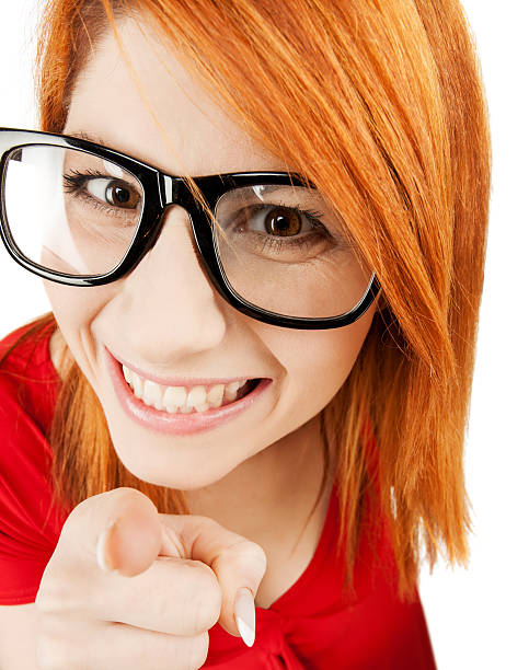 istock woman in glasses pointing finger 451343079