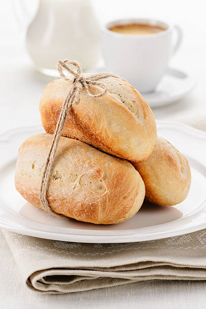 Breakfast - wheat baguettes with coffee and milk stock photo