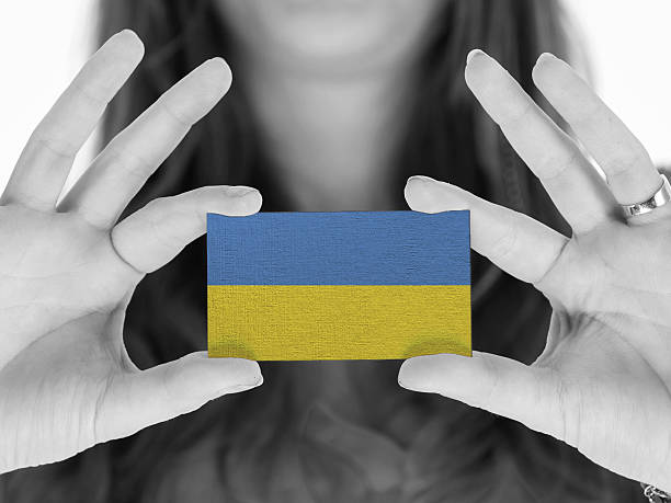 istock Woman showing a business card 451344555