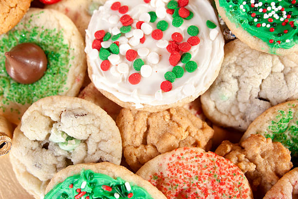 Christmas Cookie Background Macro shot of Christmas cookies for a Christmas food background. round sugar cookie stock pictures, royalty-free photos & images