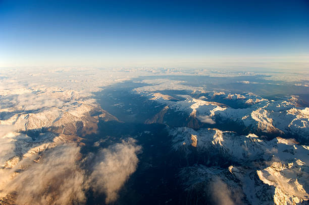 istock High altitude view of mountains. 451354877
