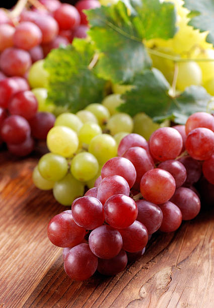 istock bunches of red and green grapes 451360625