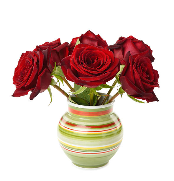 istock Red roses in a vase 451374333