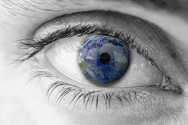 istock Planet Earth in human eye 451375827