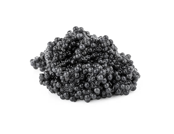 istock Little batch of black caviar. Macro photo isolated on white 451411101
