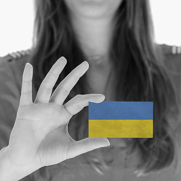 istock Woman showing a business card 451414927