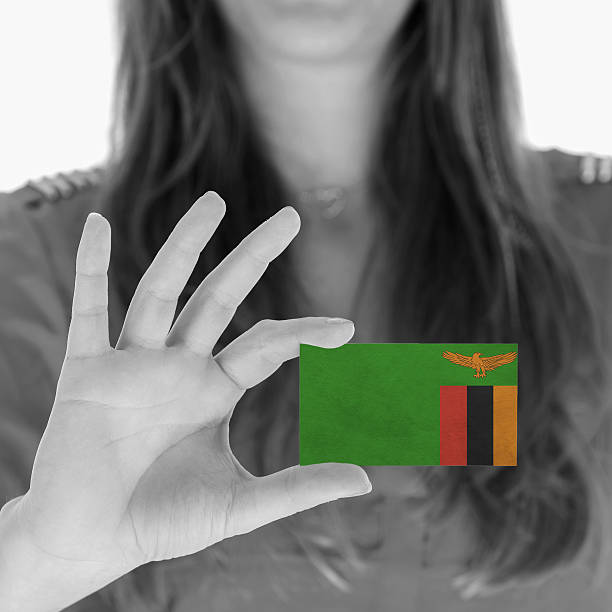 istock Woman showing a business card 451415137