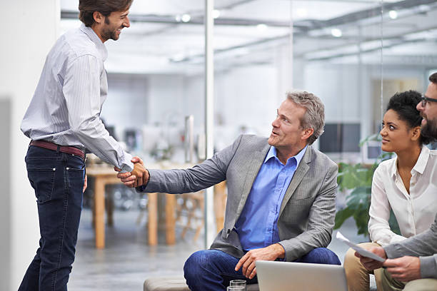 istock Welcome to the team young man! 451416339