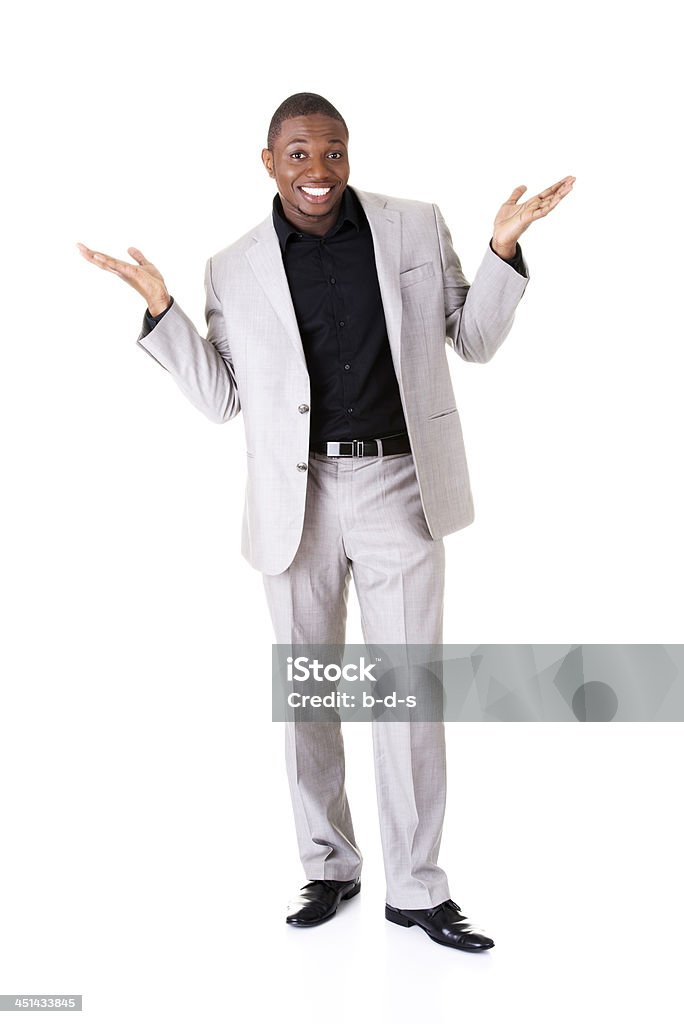 Handsome business man presenting copy space on hands. Handsome business man presenting copy space on hands. Isolated on white. Adult Stock Photo