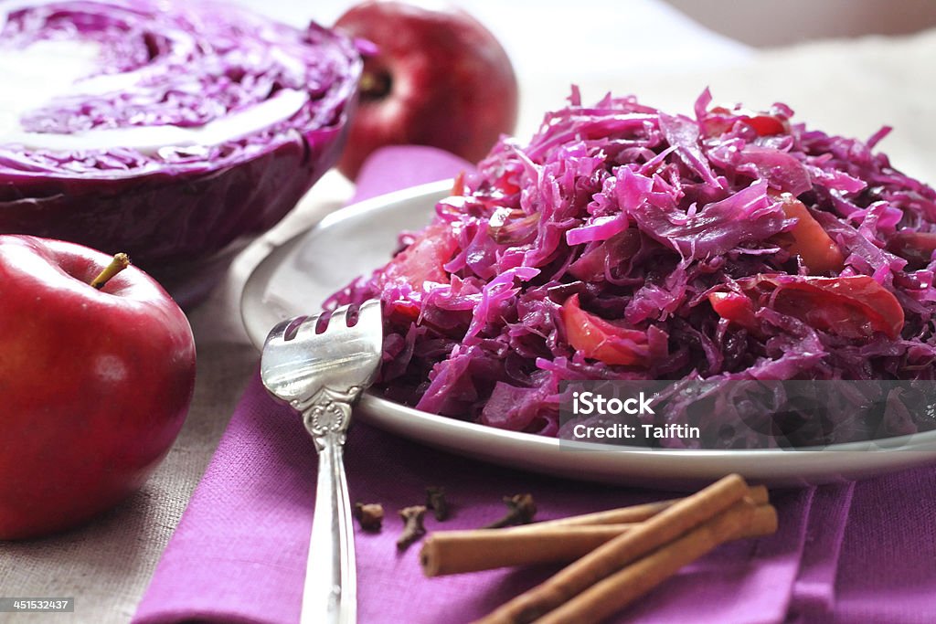 Spicy red cabbage stewed with apples Spicy red cabbage stewed with apples and cinnamon Allspice Stock Photo