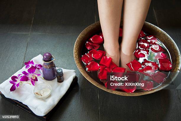 Woman Soaking Her Feet In Rose Petal Water Stock Photo - Download Image Now - Bathtub, China - East Asia, Chinese Ethnicity