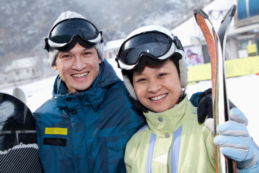 Smiling Couple in Ski Resort 