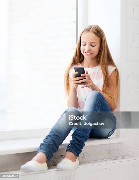 Girl With Smartphone At School Stock Photo - Download Image Now - Adult Student, Beautiful People, Beauty