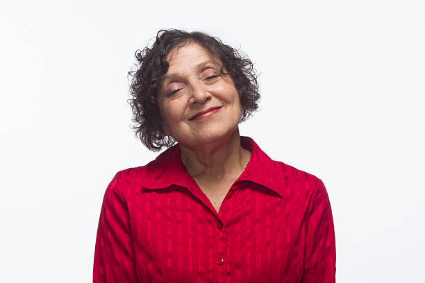 istock Content woman with eyes closed, horizontal 451560853