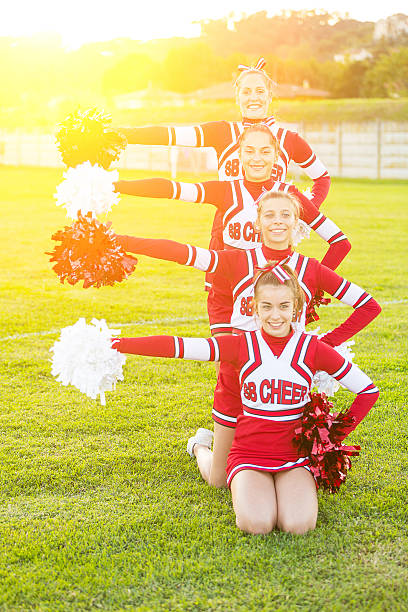 istock Group of Cheerleaders in the Field 451562221