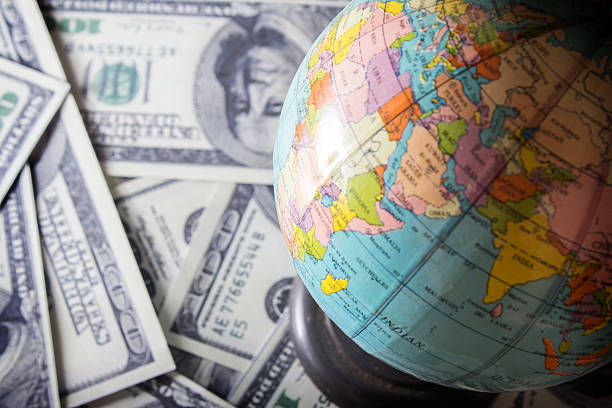 istock World currency, money and globe 451567637