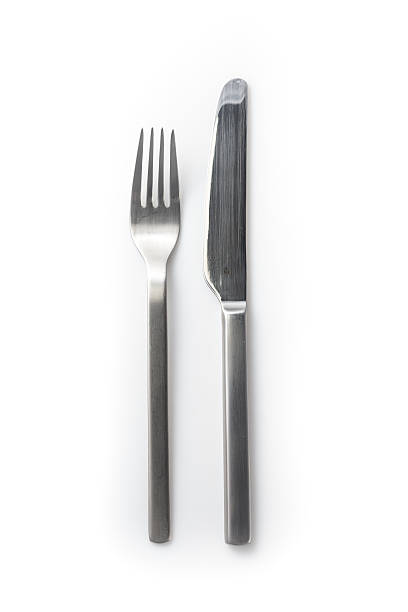 istock stainless steel knife and fork isolated on a white background 451576861