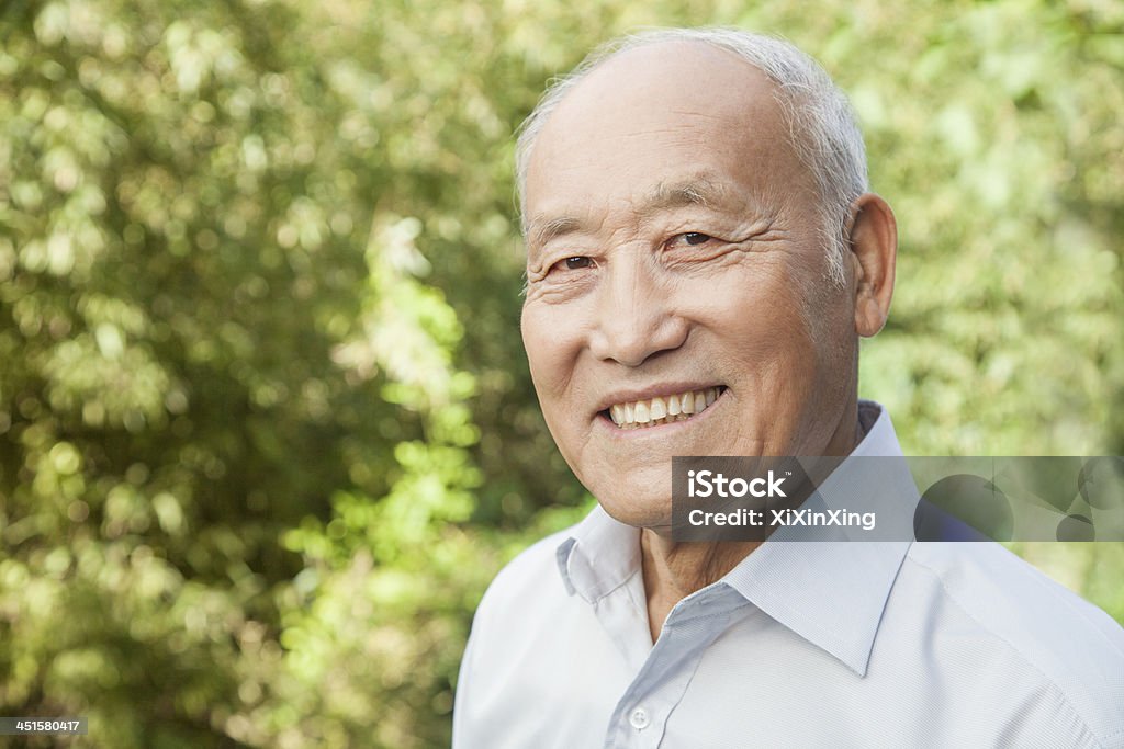 Portrait of an elderly man with a happy expression and smile Portrait of Elderly Man Senior Adult Stock Photo