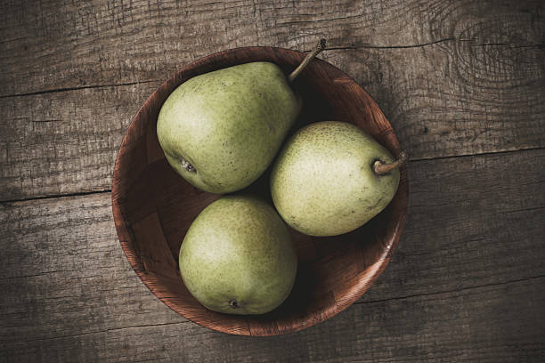 istock Group of pears on wood 451582659