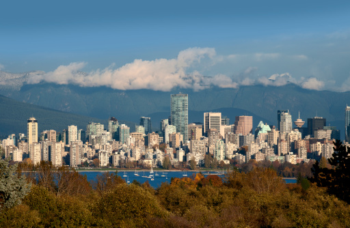 Vancouver - skyline with Coast Mountains and English Bay