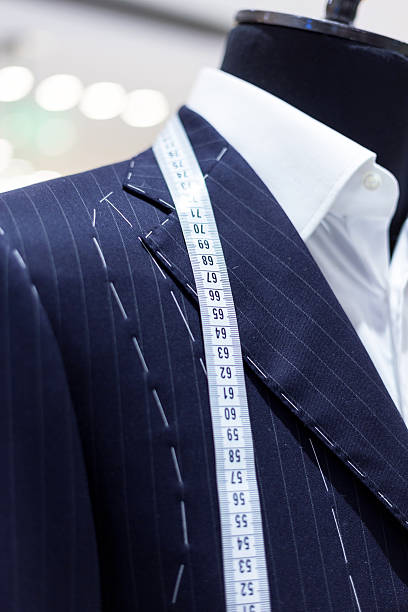 istock Suits on shop mannequins 451584917