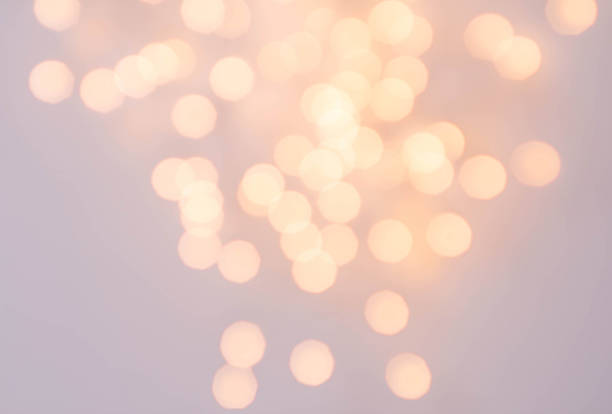 istock Bokeh Abstract Christmas background with glowing magic crystal h 451588383