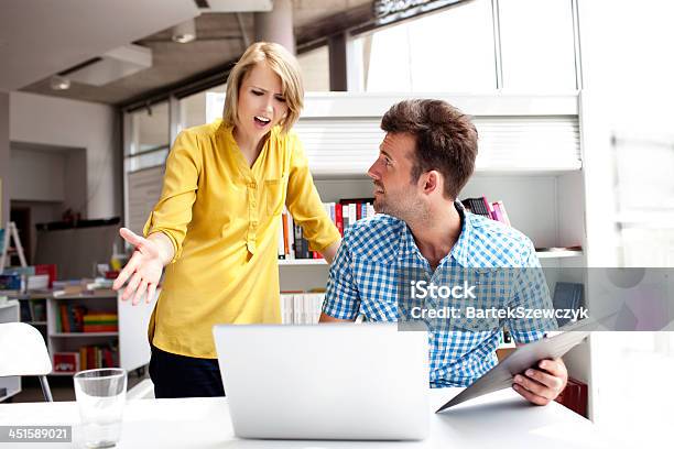 Business Partners Pick A Quarrel Stock Photo - Download Image Now - Arguing, Office, Computer