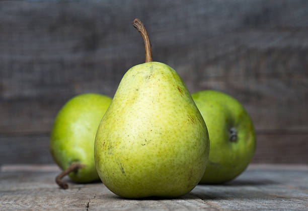 istock Group of pears on wood 451591225