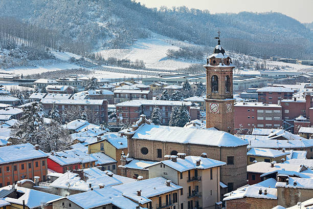 istock Small town covered with snow in Piedmont, Italy. 451591829