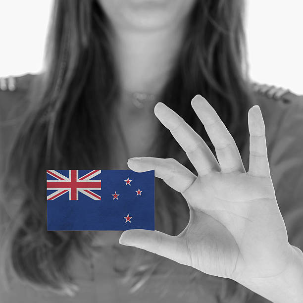 istock Woman showing a business card 451596993