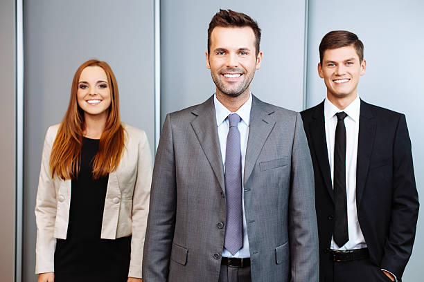 istock Three happy business people 451612365