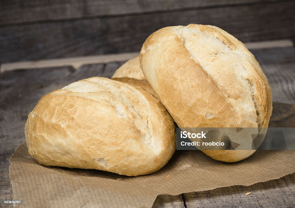 Wheat bread roll on a cutting board Autumn Stock Photo