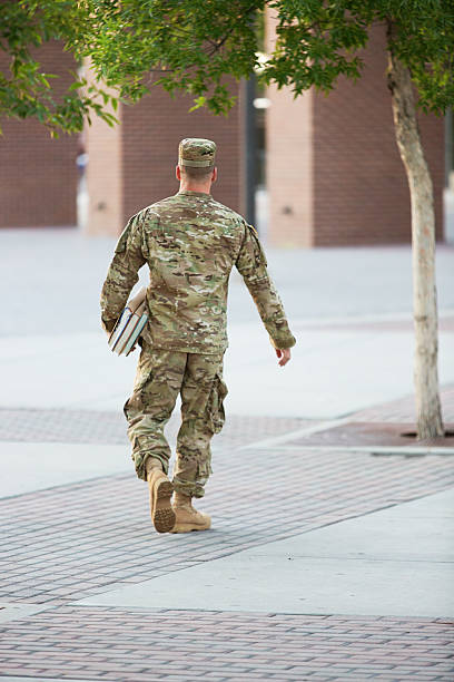istock American Soldier with books 451617601