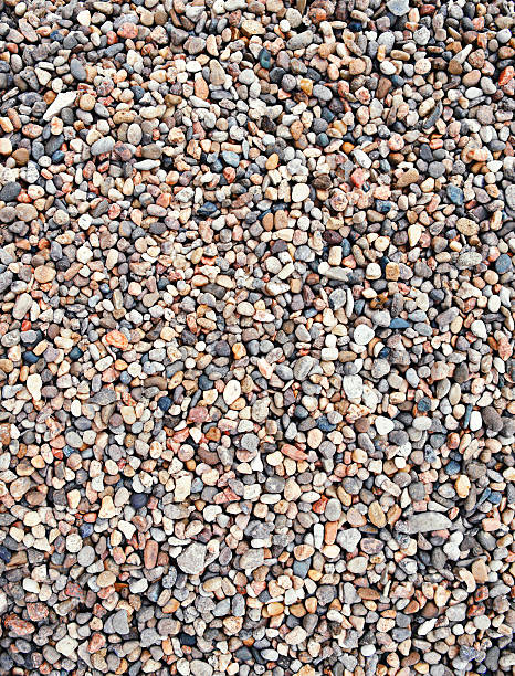 istock Pebbles and Stones, River Rocks Background 451617619