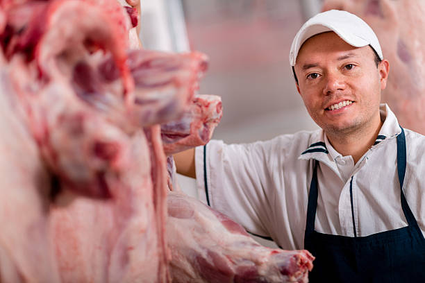istock Happy butcher smiling 451622299