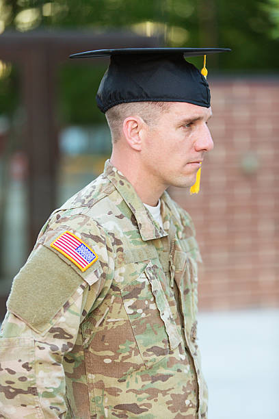 istock American Soldier with graduation hat 451630291