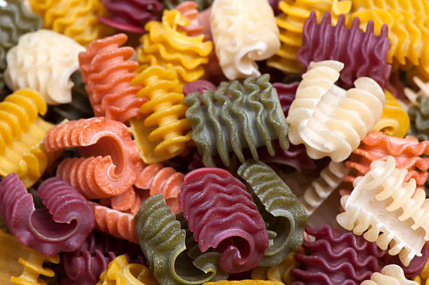 istock Raw color wavy noodles 451631265