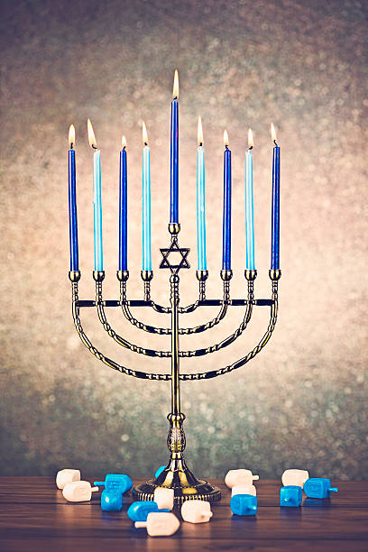 istock Menorah with Burning Candles for Hanukkah 451632259